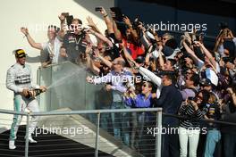 Race winner Lewis Hamilton (GBR) Mercedes AMG F1 celebrates on the podium. 02.11.2014. Formula 1 World Championship, Rd 17, United States Grand Prix, Austin, Texas, USA, Race Day.