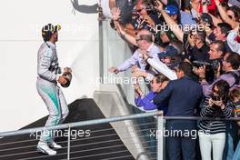 Race winner Lewis Hamilton (GBR) Mercedes AMG F1 celebrates on the podium. 02.11.2014. Formula 1 World Championship, Rd 17, United States Grand Prix, Austin, Texas, USA, Race Day.