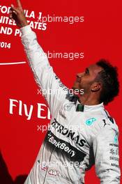 Race winner Lewis Hamilton (GBR) Mercedes AMG F1 celebrates on the podium. 02.11.2014. Formula 1 World Championship, Rd 17, United States Grand Prix, Austin, Texas, USA, Race Day.