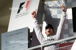 Race winner Lewis Hamilton (GBR) Mercedes AMG F1 celebrates on the podium. 02.11.2014. Formula 1 World Championship, Rd 17, United States Grand Prix, Austin, Texas, USA, Race Day.