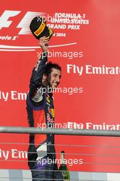 Daniel Ricciardo (AUS) Red Bull Racing celebrates his third position on the podium. 02.11.2014. Formula 1 World Championship, Rd 17, United States Grand Prix, Austin, Texas, USA, Race Day.