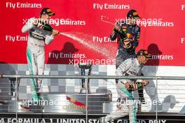 The podium (L to R): Nico Rosberg (GER) Mercedes AMG F1, second; Lewis Hamilton (GBR) Mercedes AMG F1, race winner; Daniel Ricciardo (AUS) Red Bull Racing, third. 02.11.2014. Formula 1 World Championship, Rd 17, United States Grand Prix, Austin, Texas, USA, Race Day.