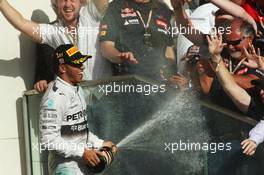 Race winner Lewis Hamilton (GBR) Mercedes AMG F1 celebrates on the podium. 02.11.2014. Formula 1 World Championship, Rd 17, United States Grand Prix, Austin, Texas, USA, Race Day.