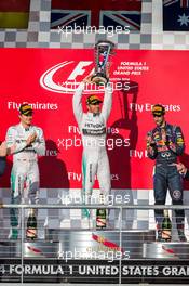 The podium (L to R): Nico Rosberg (GER) Mercedes AMG F1, second; Lewis Hamilton (GBR) Mercedes AMG F1, race winner; Daniel Ricciardo (AUS) Red Bull Racing, third. 02.11.2014. Formula 1 World Championship, Rd 17, United States Grand Prix, Austin, Texas, USA, Race Day.