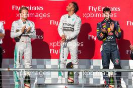 The podium (L to R): Nico Rosberg (GER) Mercedes AMG F1, second; Lewis Hamilton (GBR) Mercedes AMG F1, race winner; Daniel Ricciardo (AUS) Red Bull Racing, third. 02.11.2014. Formula 1 World Championship, Rd 17, United States Grand Prix, Austin, Texas, USA, Race Day.