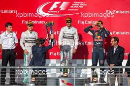 The podium (L to R): Nico Rosberg (GER) Mercedes AMG F1, second; Lewis Hamilton (GBR) Mercedes AMG F1, race winner; Daniel Ricciardo (AUS) Red Bull Racing, third. 02.11.2014. Formula 1 World Championship, Rd 17, United States Grand Prix, Austin, Texas, USA, Race Day.