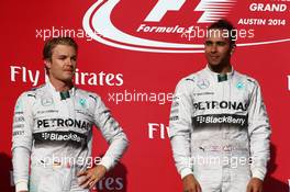 2nd place Nico Rosberg (GER) Mercedes AMG F1 W05 and 1st place Lewis Hamilton (GBR) Mercedes AMG F1. 02.11.2014. Formula 1 World Championship, Rd 17, United States Grand Prix, Austin, Texas, USA, Race Day.