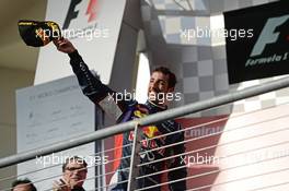 Daniel Ricciardo (AUS) Red Bull Racing celebrates his third position on the podium. 02.11.2014. Formula 1 World Championship, Rd 17, United States Grand Prix, Austin, Texas, USA, Race Day.