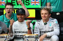 1st place Lewis Hamilton (GBR) Mercedes AMG F1 with 2nd place Nico Rosberg (GER) Mercedes AMG F1 W05. 02.11.2014. Formula 1 World Championship, Rd 17, United States Grand Prix, Austin, Texas, USA, Race Day.