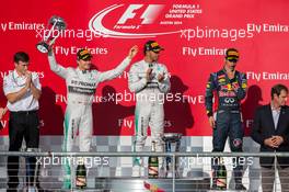 The podium (L to R): Nico Rosberg (GER) Mercedes AMG F1, second; Lewis Hamilton (GBR) Mercedes AMG F1, race winner; Daniel Ricciardo (AUS) Red Bull Racing, third. 02.11.2014. Formula 1 World Championship, Rd 17, United States Grand Prix, Austin, Texas, USA, Race Day.