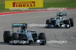 Nico Rosberg (GER) Mercedes AMG F1 W05 leads team mate Lewis Hamilton (GBR) Mercedes AMG F1 W05. 02.11.2014. Formula 1 World Championship, Rd 17, United States Grand Prix, Austin, Texas, USA, Race Day.