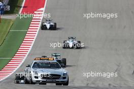 Nico Rosberg (GER) Mercedes AMG F1 W05 leads behind the FIA Safety Car. 02.11.2014. Formula 1 World Championship, Rd 17, United States Grand Prix, Austin, Texas, USA, Race Day.