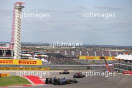 Jenson Button (GBR) McLaren MP4-29 and team mate Kevin Magnussen (DEN) McLaren MP4-29 battle for position. 02.11.2014. Formula 1 World Championship, Rd 17, United States Grand Prix, Austin, Texas, USA, Race Day.