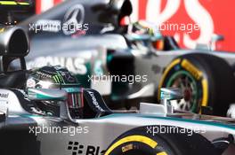 Nico Rosberg (GER) Mercedes AMG F1 W05 and Lewis Hamilton (GBR) Mercedes AMG F1 on the grid at the start of the race. 02.11.2014. Formula 1 World Championship, Rd 17, United States Grand Prix, Austin, Texas, USA, Race Day.