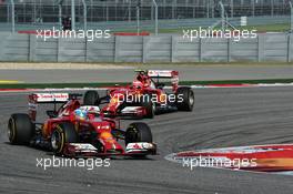 Fernando Alonso (ESP) Ferrari F14-T leads Kimi Raikkonen (FIN) Ferrari F14-T. 02.11.2014. Formula 1 World Championship, Rd 17, United States Grand Prix, Austin, Texas, USA, Race Day.