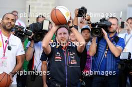 Christian Horner (GBR) Red Bull Racing Team Principal practices his basketball skills with Tony Parker (FRA) NBA Basketball Player (Left). 01.11.2014. Formula 1 World Championship, Rd 17, United States Grand Prix, Austin, Texas, USA, Qualifying Day.