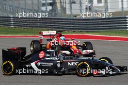 Adrian Sutil (GER) Sauber C33 and Fernando Alonso (ESP) Ferrari F14-T. 01.11.2014. Formula 1 World Championship, Rd 17, United States Grand Prix, Austin, Texas, USA, Qualifying Day.