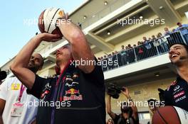 Christian Horner (GBR) Red Bull Racing Team Principal (Centre) practices his basketball skills with Tony Parker (FRA) NBA Basketball Player (Left) and Daniel Ricciardo (AUS) Red Bull Racing (Right). 01.11.2014. Formula 1 World Championship, Rd 17, United States Grand Prix, Austin, Texas, USA, Qualifying Day.