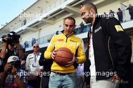 (L to R): Cyril Abiteboul (FRA) Renault Sport F1 Managing Director with Tony Parker (FRA) NBA Basketball Player. 01.11.2014. Formula 1 World Championship, Rd 17, United States Grand Prix, Austin, Texas, USA, Qualifying Day.