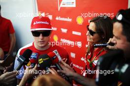 Kimi Raikkonen (FIN) Ferrari with the media. 30.10.2014. Formula 1 World Championship, Rd 17, United States Grand Prix, Austin, Texas, USA, Preparation Day.