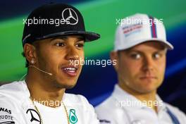 (L to R): Lewis Hamilton (GBR) Mercedes AMG F1 and Valtteri Bottas (FIN) Williams in the FIA Press Conference. 30.10.2014. Formula 1 World Championship, Rd 17, United States Grand Prix, Austin, Texas, USA, Preparation Day.