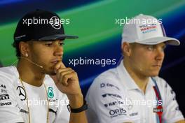 (L to R): Lewis Hamilton (GBR) Mercedes AMG F1 and Valtteri Bottas (FIN) Williams in the FIA Press Conference. 30.10.2014. Formula 1 World Championship, Rd 17, United States Grand Prix, Austin, Texas, USA, Preparation Day.