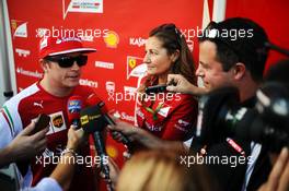 Kimi Raikkonen (FIN) Ferrari with the media. 30.10.2014. Formula 1 World Championship, Rd 17, United States Grand Prix, Austin, Texas, USA, Preparation Day.