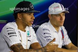 (L to R): Lewis Hamilton (GBR) Mercedes AMG F1 and Valtteri Bottas (FIN) Williams in the FIA Press Conference. 30.10.2014. Formula 1 World Championship, Rd 17, United States Grand Prix, Austin, Texas, USA, Preparation Day.