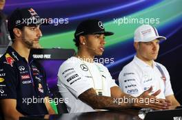 (L to R): Daniel Ricciardo (AUS) Red Bull Racing with Lewis Hamilton (GBR) Mercedes AMG F1 and Valtteri Bottas (FIN) Williams in the FIA Press Conference. 30.10.2014. Formula 1 World Championship, Rd 17, United States Grand Prix, Austin, Texas, USA, Preparation Day.