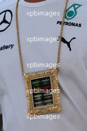A necklace worn by Lewis Hamilton (GBR) Mercedes AMG F1. 30.10.2014. Formula 1 World Championship, Rd 17, United States Grand Prix, Austin, Texas, USA, Preparation Day.