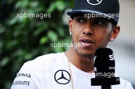 Lewis Hamilton (GBR) Mercedes AMG F1 with the media. 30.10.2014. Formula 1 World Championship, Rd 17, United States Grand Prix, Austin, Texas, USA, Preparation Day.