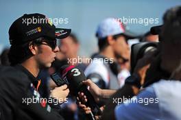 Sergio Perez (MEX) Sahara Force India F1 with the media. 30.10.2014. Formula 1 World Championship, Rd 17, United States Grand Prix, Austin, Texas, USA, Preparation Day.