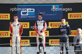 Race 1, 1st position Stoffel Vandoorne (BEL) Art Grand Prix, 2nd position Arthur Pic (FRA) Campos Racing and 3rd position Mitch Evans (NZL) RT Russian Time 06.09.2014. GP2 Series, Rd 09, Monza, Italy, Saturday.