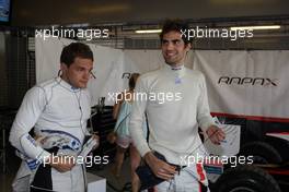 Simon Trummer (SUI) Rapax and Kevin Giovesi (ITA) Rapax 21.11.2014. GP2 Series, Rd 11, Yas Marina Circuit, Abu Dhabi, UAE, Friday.