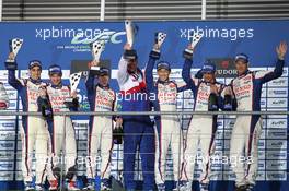 The podium (L to R): #08  Sebastien Buemi (SUI) / Stephane Sarrazin (FRA) Anthony Davidson (GBR) - Toyota Racing, Toyota TS040, Hybrid, race winners; #07 Kazuki Nakajima (JPN) / Nicolas Lapierre (FRA) / Alexander Wurz (AUT) - Toyota Racing, Toyota TS040, Hybrid, third. 03.05.2014. FIA World Endurance Championship, Round 2, Spa-Francorchamps, Belgium, Saturday.