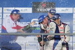 Race winner Stephane Sarrazin (FRA) Toyota Racing celebrates with his team mates Anthony Davidson (GBR) and Sebastien Buemi (SUI) on the podium. 03.05.2014. FIA World Endurance Championship, Round 2, Spa-Francorchamps, Belgium, Saturday.