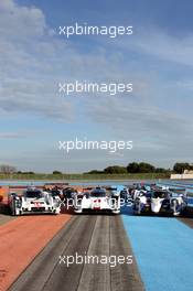 (L to R): The cars of #14 Romain Dumas (FRA) / Neel Jani (SUI) / Marc Lieb (GER), Porsche Team, Porsche 919 Hybrid, #01 Tom Kristensen (DEN) / Loic Duval (FRA) /  Allan McNish (GBR) Audi Sport Team Joest, Audi R18 e-tron quattro, #07 Alexander Wurz (AUT) / Nicolas Lapierre (FRA) / Kazuki Nakajima (JPN) Toyota Racing, Toyota TS040, Hybrid. 27.03.2014. FIA World Endurance Championship, 'Prologue' Official Test Days, Paul Ricard, France. Thursday.