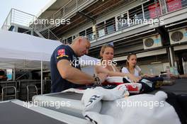   (L-R) Tom Coronel (NLD) Cevrolet RML Cruze TC1, Roal Motorsport with his girlfriend and the girlfriend of JosÃ© Maria Lopez (ARG) Citroen C-Elysee WTCC, Citroen Total WTCC  11.04.2014. World Touring Car Championship, Rounds 01 and 02, Marrakech, Morocco.