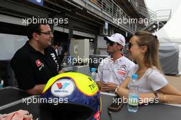 10.04.2014- (L-R) Dominik Greiner (GER) Team Principal, ALL-INKL_COM Munnich Motorsport  with José Maria Lopez (ARG) Citroen C-Elysée WTCC, Citroen Total WTCC and his wife