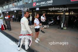   Free Practice 1, SÃ©bastien Loeb (FRA) Citroen C-ElysÃ©e WTCC, Citroen Total WTCC and his wife   12.04.2014. World Touring Car Championship, Rounds 01 and 02, Marrakech, Morocco.