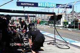 Romain Grosjean (FRA) Lotus F1 E23 in the pits. 13.03.2015. Formula 1 World Championship, Rd 1, Australian Grand Prix, Albert Park, Melbourne, Australia, Practice Day.
