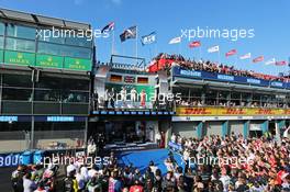 The podium (L to R): Nico Rosberg (GER) Mercedes AMG F1, second; Lewis Hamilton (GBR) Mercedes AMG F1, race winner; Sebastian Vettel (GER) Ferrari, third. 15.03.2015. Formula 1 World Championship, Rd 1, Australian Grand Prix, Albert Park, Melbourne, Australia, Race Day.