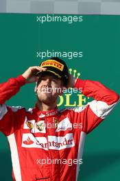 3rd place Sebastian Vettel (GER) Ferrari SF15-T. 15.03.2015. Formula 1 World Championship, Rd 1, Australian Grand Prix, Albert Park, Melbourne, Australia, Race Day.