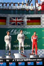1st place Lewis Hamilton (GBR) Mercedes AMG F1, 2nd place Nico Rosberg (GER) Mercedes AMG F1 W06 and 3rd place Sebastian Vettel (GER) Ferrari. 15.03.2015. Formula 1 World Championship, Rd 1, Australian Grand Prix, Albert Park, Melbourne, Australia, Race Day.