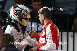 1st place Lewis Hamilton (GBR) Mercedes AMG F1 W06 and 3rd place Sebastian Vettel (GER) Ferrari. 15.03.2015. Formula 1 World Championship, Rd 1, Australian Grand Prix, Albert Park, Melbourne, Australia, Race Day.