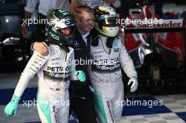 Nico Rosberg (GER) Mercedes AMG F1 W06 and Lewis Hamilton (GBR) Mercedes AMG F1. 15.03.2015. Formula 1 World Championship, Rd 1, Australian Grand Prix, Albert Park, Melbourne, Australia, Race Day.