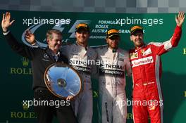 1st place Lewis Hamilton (GBR) Mercedes AMG F1, 2nd place Nico Rosberg (GER) Mercedes AMG F1 W06 and 3rd place Sebastian Vettel (GER) Ferrari. 15.03.2015. Formula 1 World Championship, Rd 1, Australian Grand Prix, Albert Park, Melbourne, Australia, Race Day.