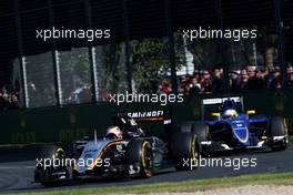 Nico Hulkenberg (GER), Sahara Force India and Marcus Ericsson (SWE), Sauber F1 Team  15.03.2015. Formula 1 World Championship, Rd 1, Australian Grand Prix, Albert Park, Melbourne, Australia, Race Day.