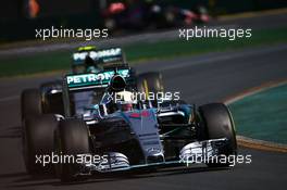 Lewis Hamilton (GBR) Mercedes AMG F1 W06 leads team mate Nico Rosberg (GER) Mercedes AMG F1 W06. 15.03.2015. Formula 1 World Championship, Rd 1, Australian Grand Prix, Albert Park, Melbourne, Australia, Race Day.