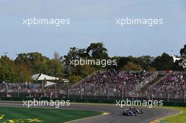 Marcus Ericsson (SWE) Sauber C34 and Sergio Perez (MEX) Sahara Force India F1 VJM08 battle for position. 15.03.2015. Formula 1 World Championship, Rd 1, Australian Grand Prix, Albert Park, Melbourne, Australia, Race Day.